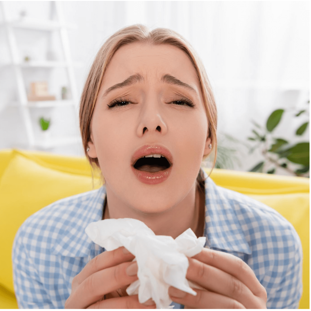 lower back pain when sneezing
